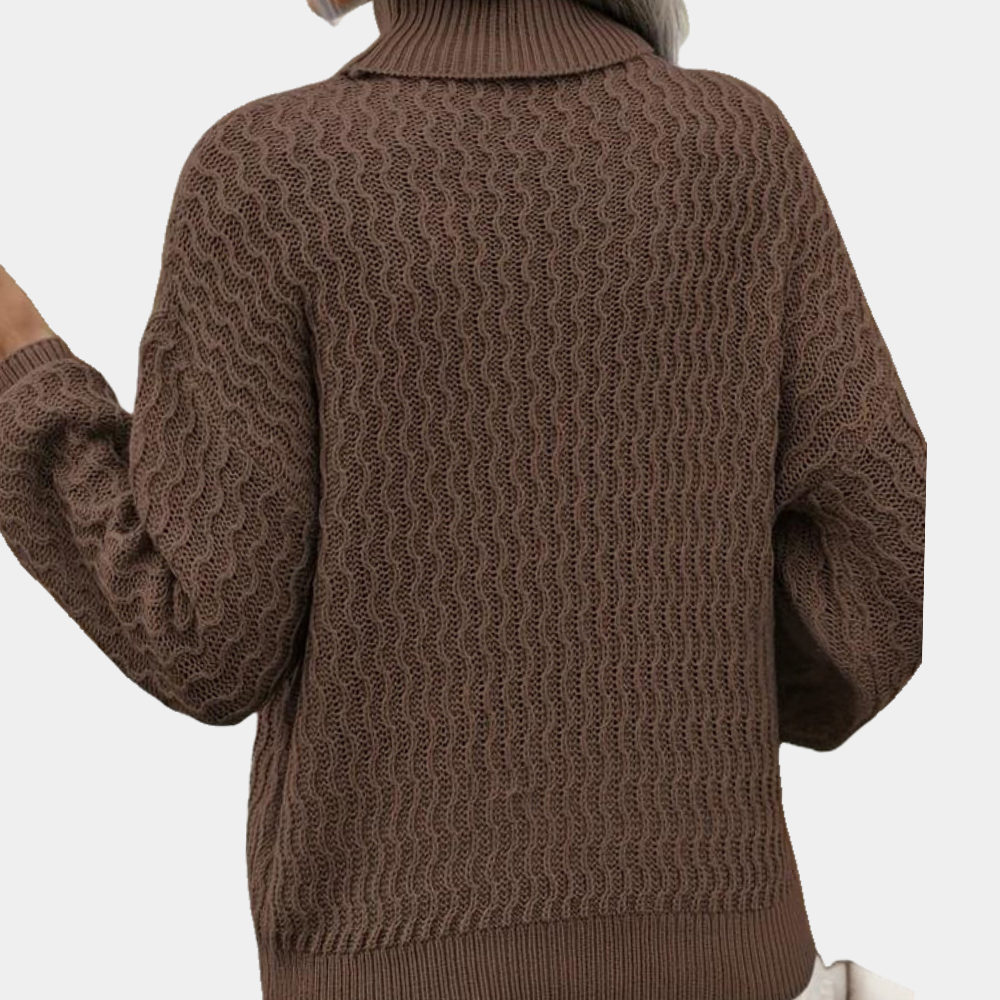 Bruine dames coltrui met golvend breipatroon, lange mouwen en comfortabele pasvorm. Perfect voor herfst- en wintermode.