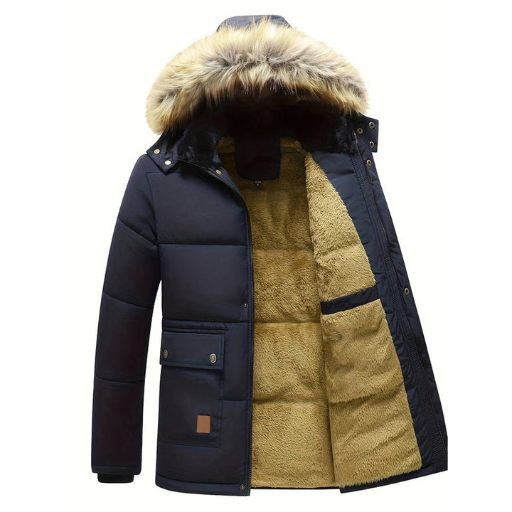 Donkerblauwe heren parka met bontkraag, warme voering en zakken. Winterjas voor heren, stijlvol en functioneel, ideaal voor koude seizoenen.
