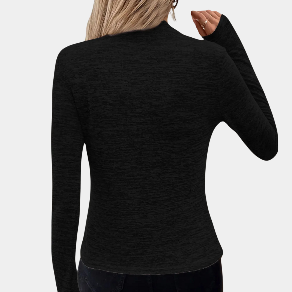 Vrouw in zwarte, lange mouwen top, rugaanzicht. Modieuze dameskleding, casual stijl, comfortabele pasvorm. Geschikt voor dagelijks gebruik.
