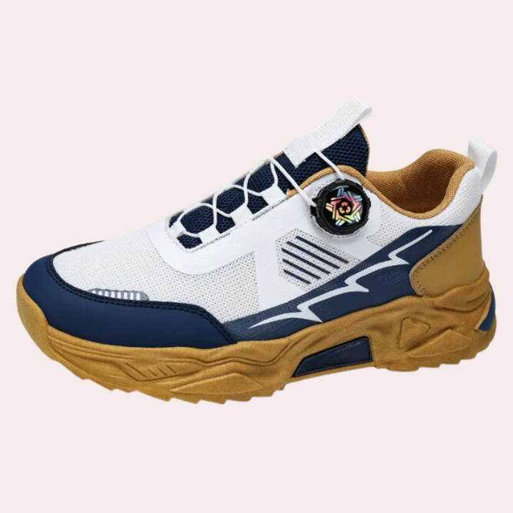 Moderne sportieve sneaker met wit, blauw en bruin ontwerp, ademend mesh, stevige zool en uniek bloemendetail. Perfect voor casual en sportief gebruik.