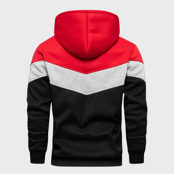 Heren hoodie met capuchon, rood-zwart-grijs kleurblok design, comfortabele pasvorm, casual streetwear, ideaal voor herfst en winter.
