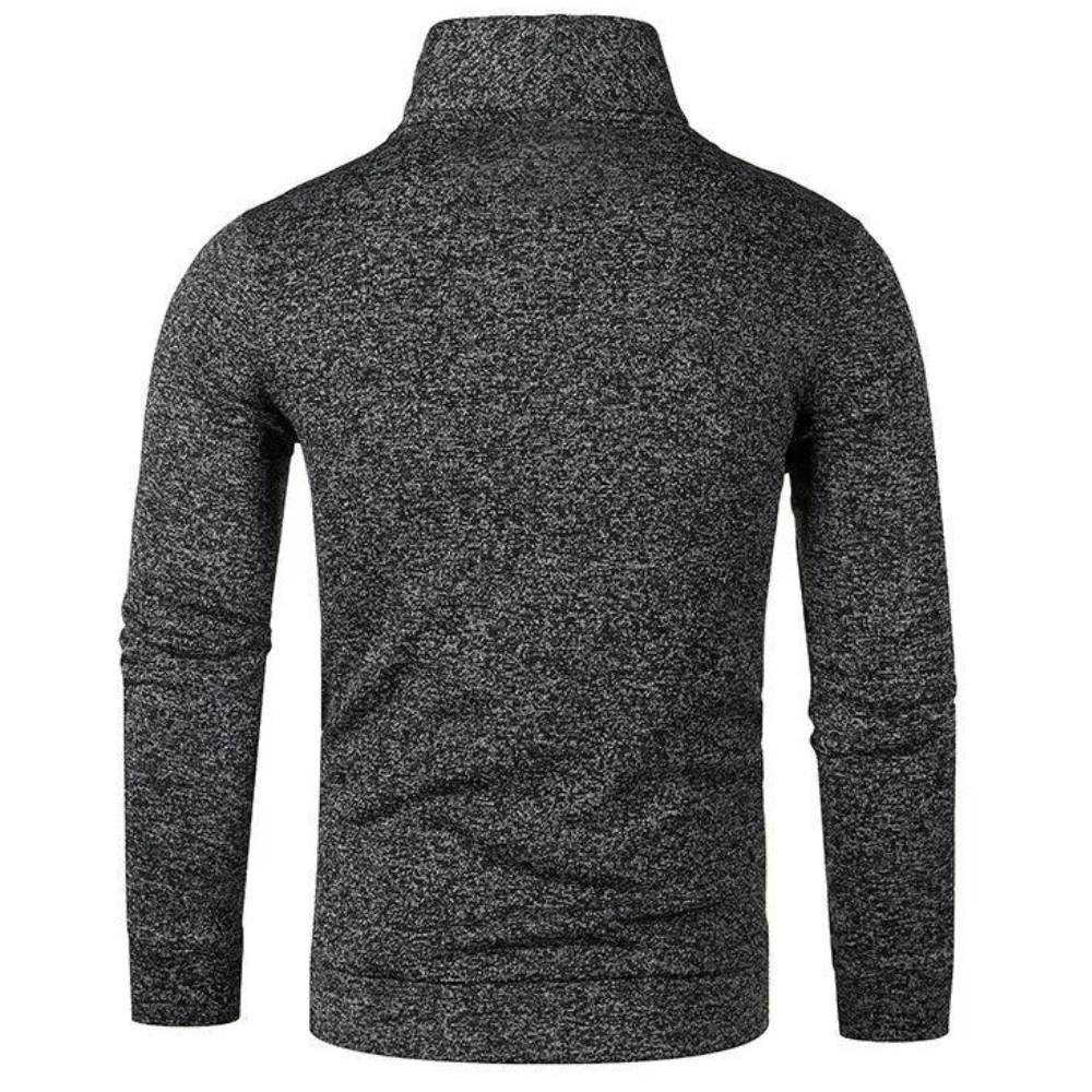 Donkergrijze gebreide trui met hoge kraag, lange mouwen en gemêleerd patroon, ideaal voor herenmode en winterkleding.