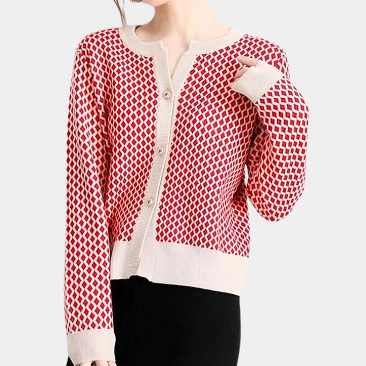 Rood-witte damestrui met geometrisch patroon, ronde hals en knoopsluiting. Modieuze gebreide cardigan, perfect voor casual en stijlvolle outfits.