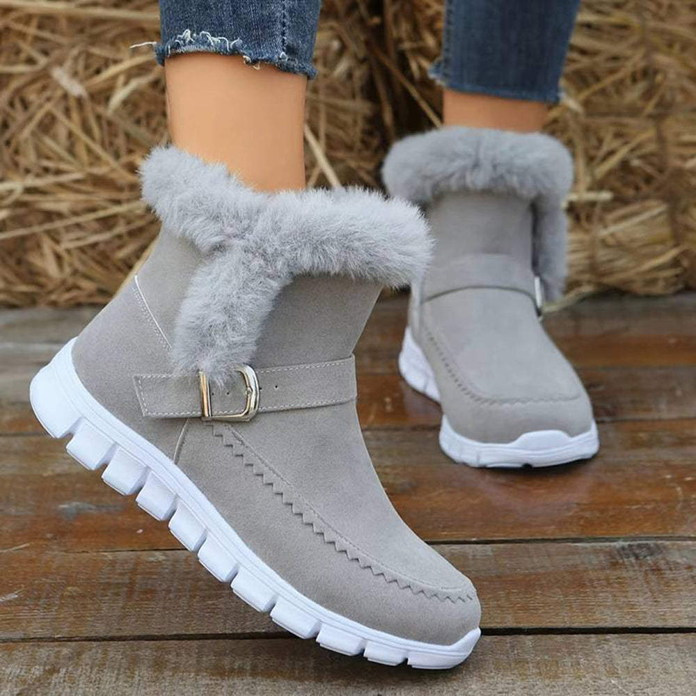 Grijze winterlaarzen met bontvoering en gesp, comfortabele antislip zool, ideaal voor koude seizoenen. Perfecte damesmode voor winterweer.