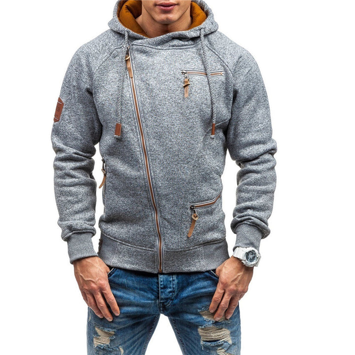Grijze heren hoodie met capuchon, ritssluiting en zakken, casual streetwear stijl, ideaal voor herfst en winter, comfortabele pasvorm.