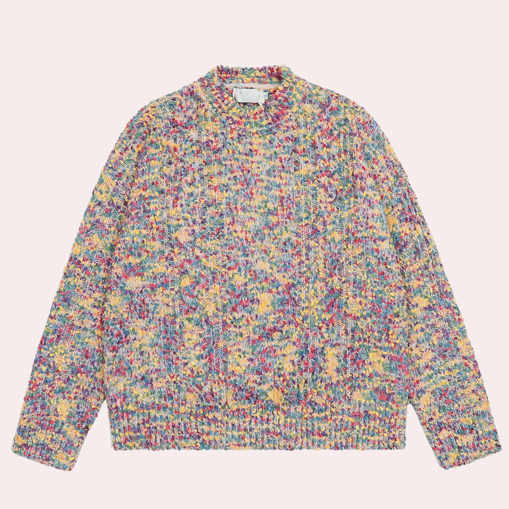 Kleurrijke gebreide trui met veelkleurig patroon, ronde hals en lange mouwen. Perfect voor herfstmode en casual outfits. Unisex design.