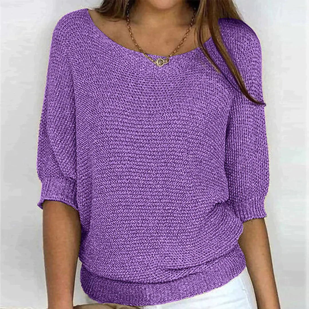 Paarse gebreide damestrui met driekwart mouwen, ronde hals en casual pasvorm. Perfect voor lente- en herfstmode. Comfortabel en stijlvol ontwerp.