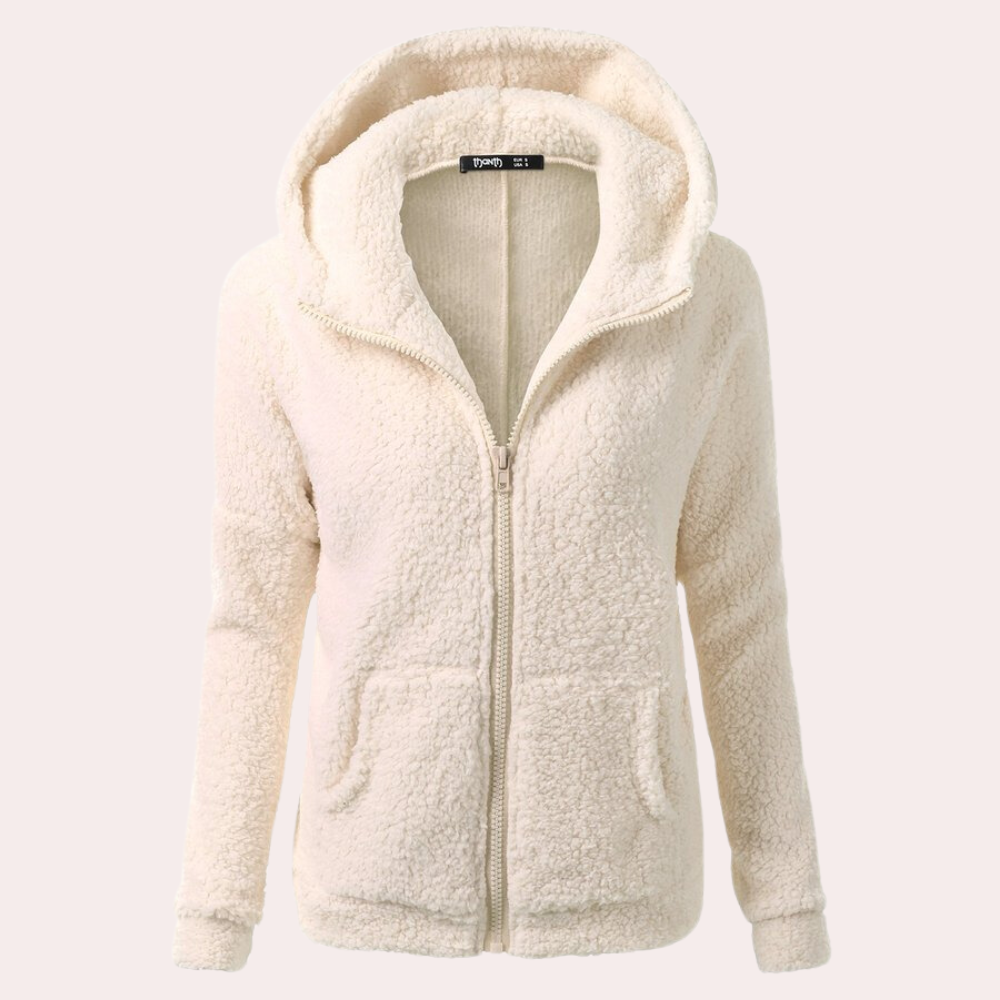 Crèmekleurige fleece dameshoodie met ritssluiting, zachte textuur, capuchon, lange mouwen. Perfect voor casual wintermode en comfort.