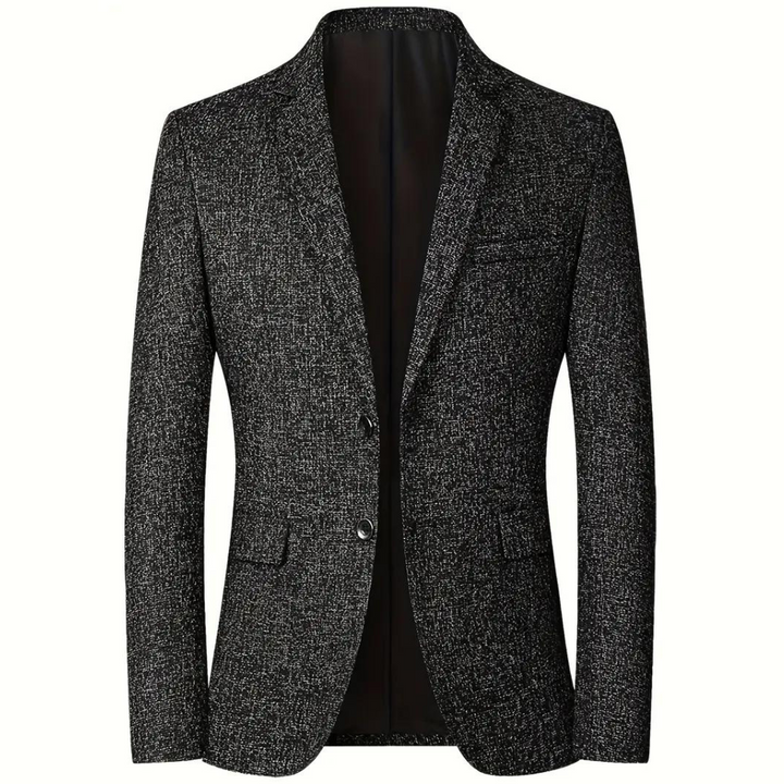 Grijze herenblazer met textuur, twee knopen en klassieke revers. Perfect voor formele gelegenheden. Stijlvolle en moderne herenkleding.