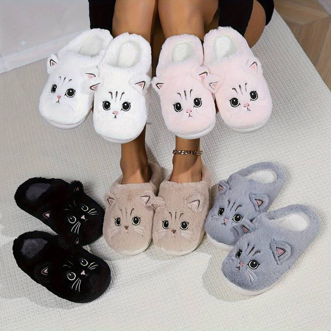 Warme kattenpantoffels in diverse kleuren: wit, roze, zwart, beige en grijs. Zachte pluche sloffen met schattig kattengezicht, perfect voor thuiscomfort.