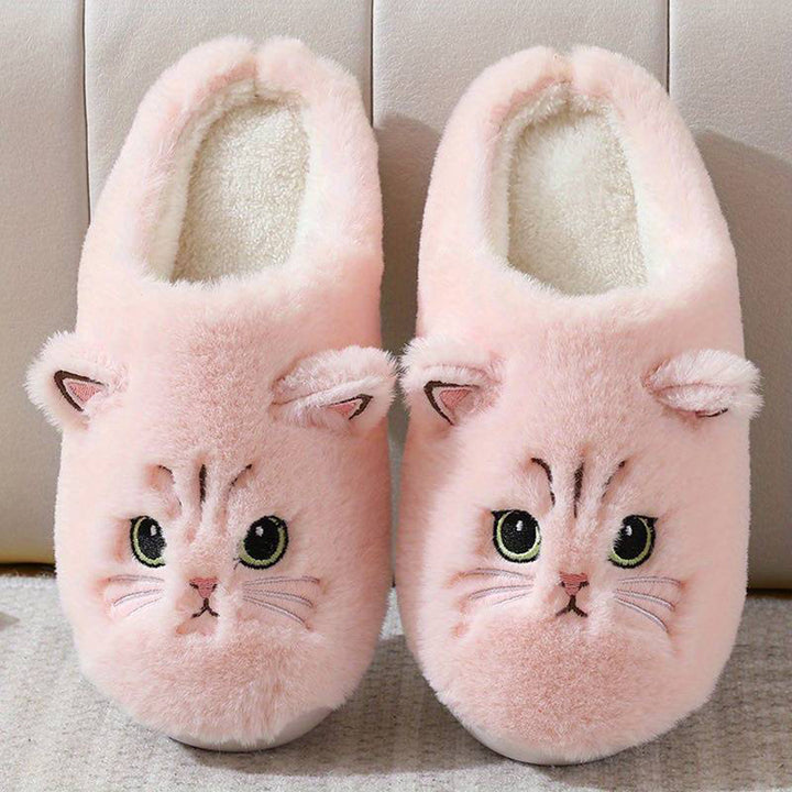 Roze kattenpantoffels met schattige kattengezichtjes, zachte pluche stof, comfortabele binnenvoering. Perfecte warme sloffen voor kattenliefhebbers.