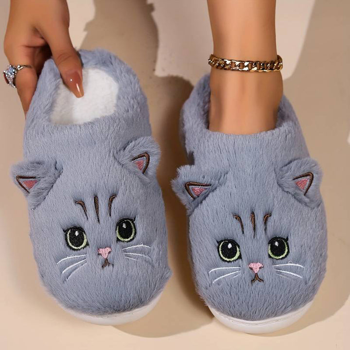 Grijze kattenpantoffels met schattig kattengezicht, zachte pluche stof, comfortabele binnenvoering. Perfect voor warme voeten in de winter.