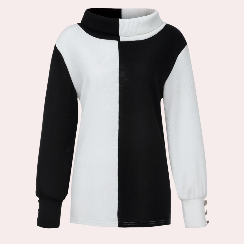 Zwart-witte coltrui met kleurblokdesign, lange mouwen en knoopdetails. Modieuze damestrui, geschikt voor herfst- en wintermode.