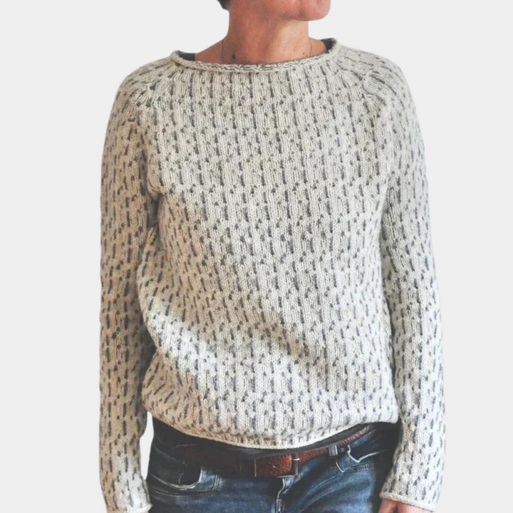 Grijze damestrui met gebreid patroon, lange mouwen en ronde hals. Perfect voor casual en winterse outfits. Comfortabele en stijlvolle damesmode.
