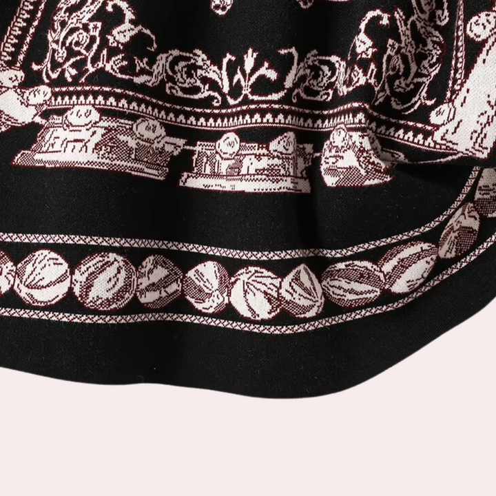 Zwart-witte sjaal met gedetailleerd barokpatroon en sierlijke randen, perfect voor modieuze accessoires en stijlvolle outfits.