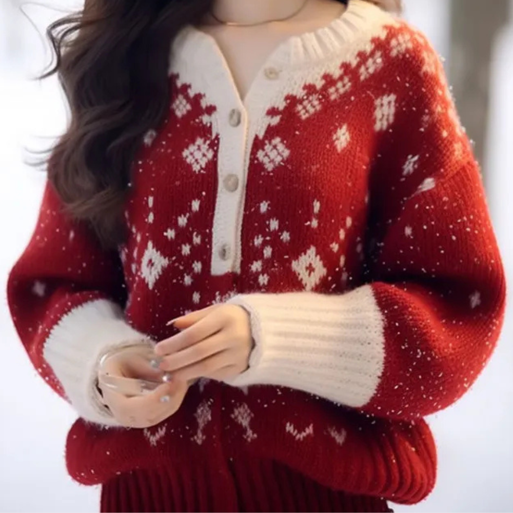 Rode gebreide trui met witte sneeuwvlokpatronen, houten knopen en geribbelde boorden, perfect voor wintermode en kerstoutfits.
