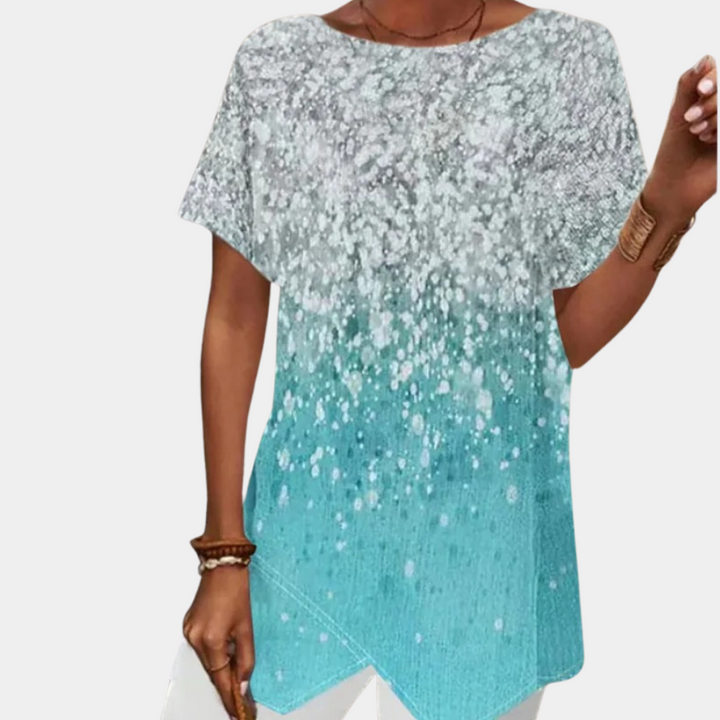 Damesjurk met geometrisch ontwerp, korte mouwen en turquoise kleurverloop. Perfect voor casual zomeroutfits. Comfortabele pasvorm.