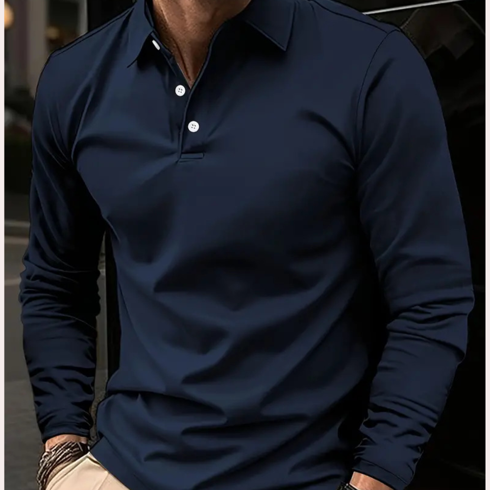 Donkerblauw herenoverhemd met lange mouwen, klassieke kraag en knoopsluiting. Stijlvol en tijdloos ontwerp voor casual en formele gelegenheden.
