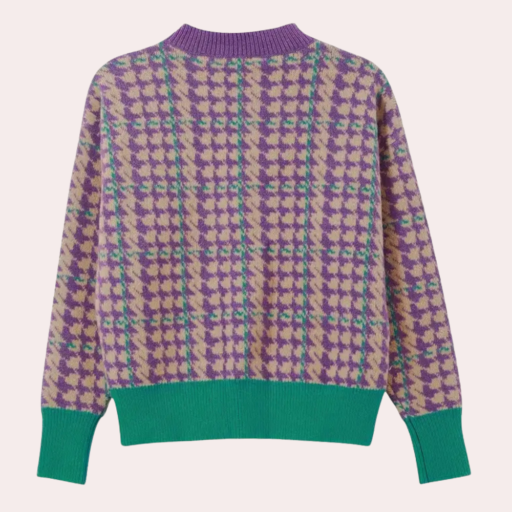 Damestrui met kleurrijk pied-de-poule patroon, paarse en groene tinten, ronde hals, lange mouwen, groene boorden. Modieuze herfstkleding.