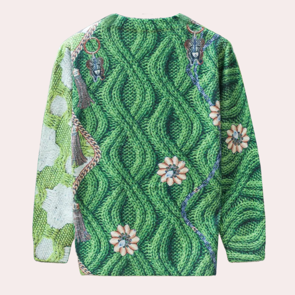 Groene gebreide trui met bloemmotief en insectendetails, kleurrijk en uniek design, perfect voor herfstmode en casual outfits.
