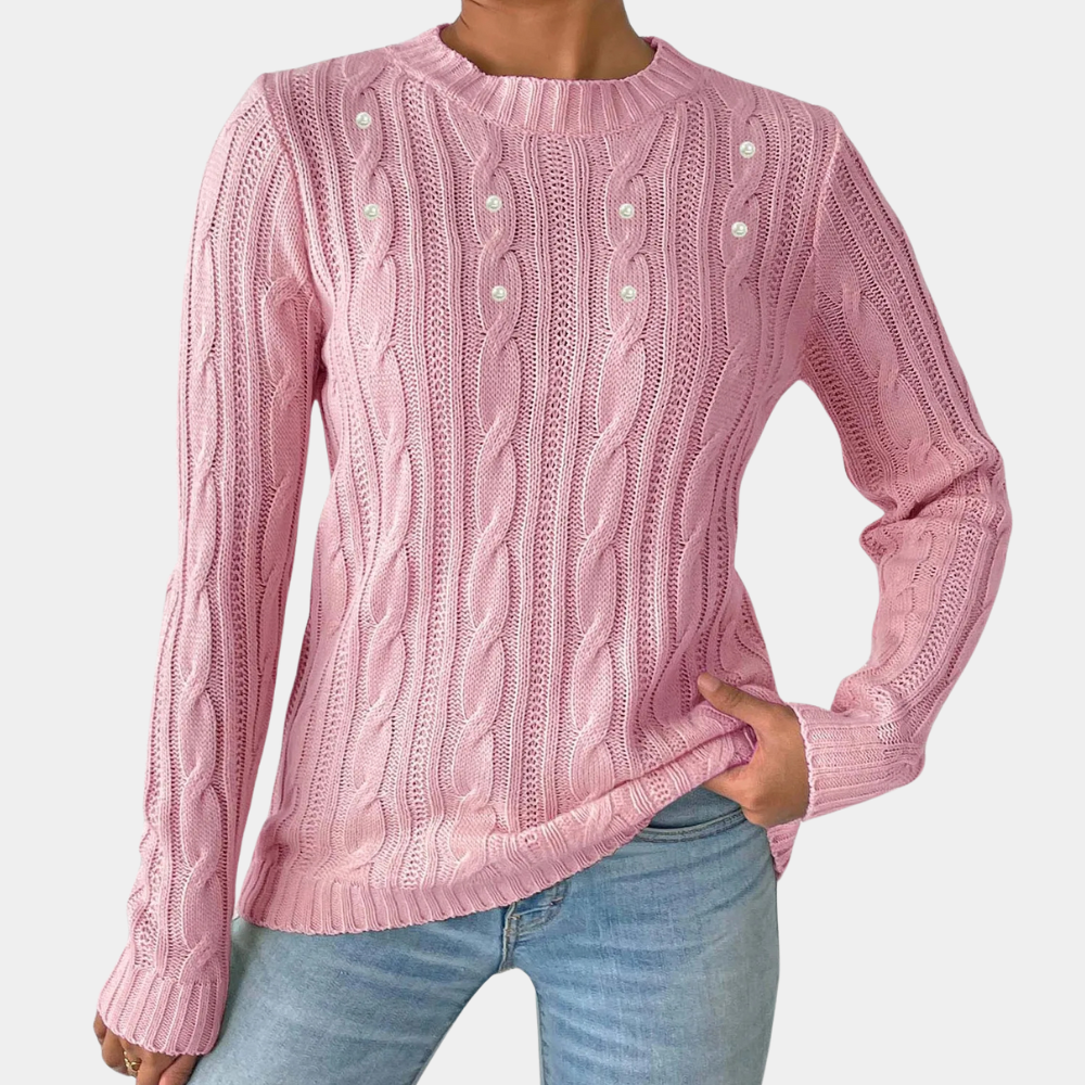 Roze kabeltrui dames, lange mouwen, ronde hals, parelknopen, casual stijl, gebreid patroon, modieuze dameskleding, herfst-winter outfit.