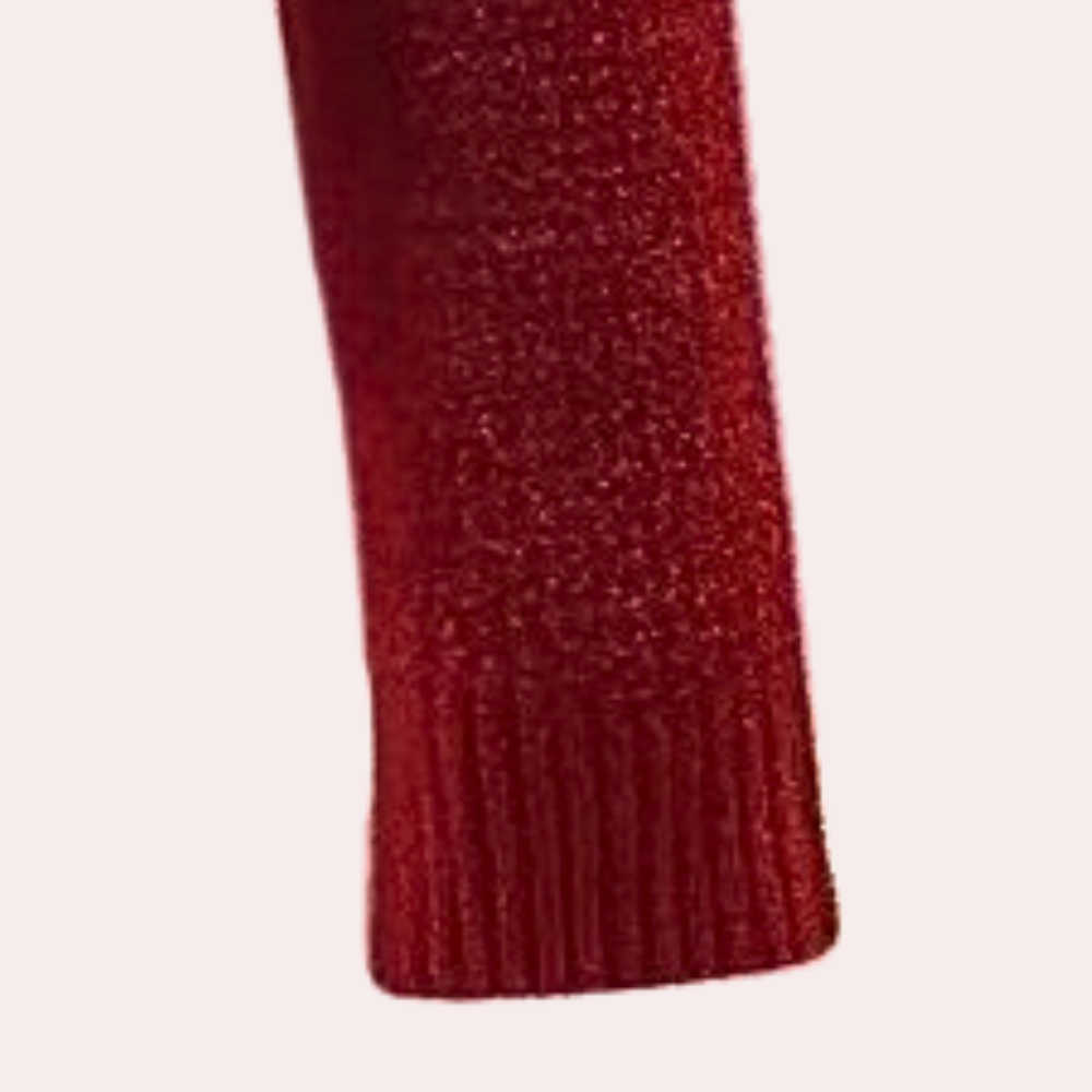 Rode gebreide mouw van wollen trui, textuur detail. Perfect voor wintermode, warme kleding, stijlvolle truien. Comfortabel en trendy design.