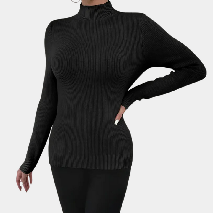 Zwarte geribbelde coltrui dames, lange mouwen, aansluitende pasvorm, modieuze winterkleding, casual en elegant, comfortabele stof.