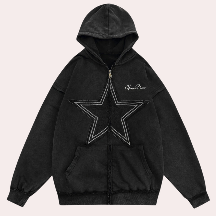 Zwarte hoodie met capuchon, grote sterprint en rits, unisex streetwear, comfortabele katoenen stof, ideaal voor casual mode en urban stijl.