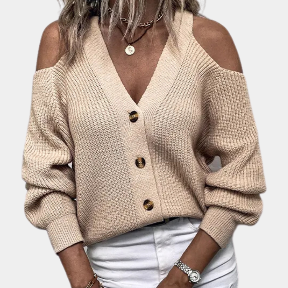 Beige damestrui met schouderuitsnijdingen, knoopsluiting en lange mouwen. Modieuze casual outfit, perfect voor herfst- en winterseizoenen.