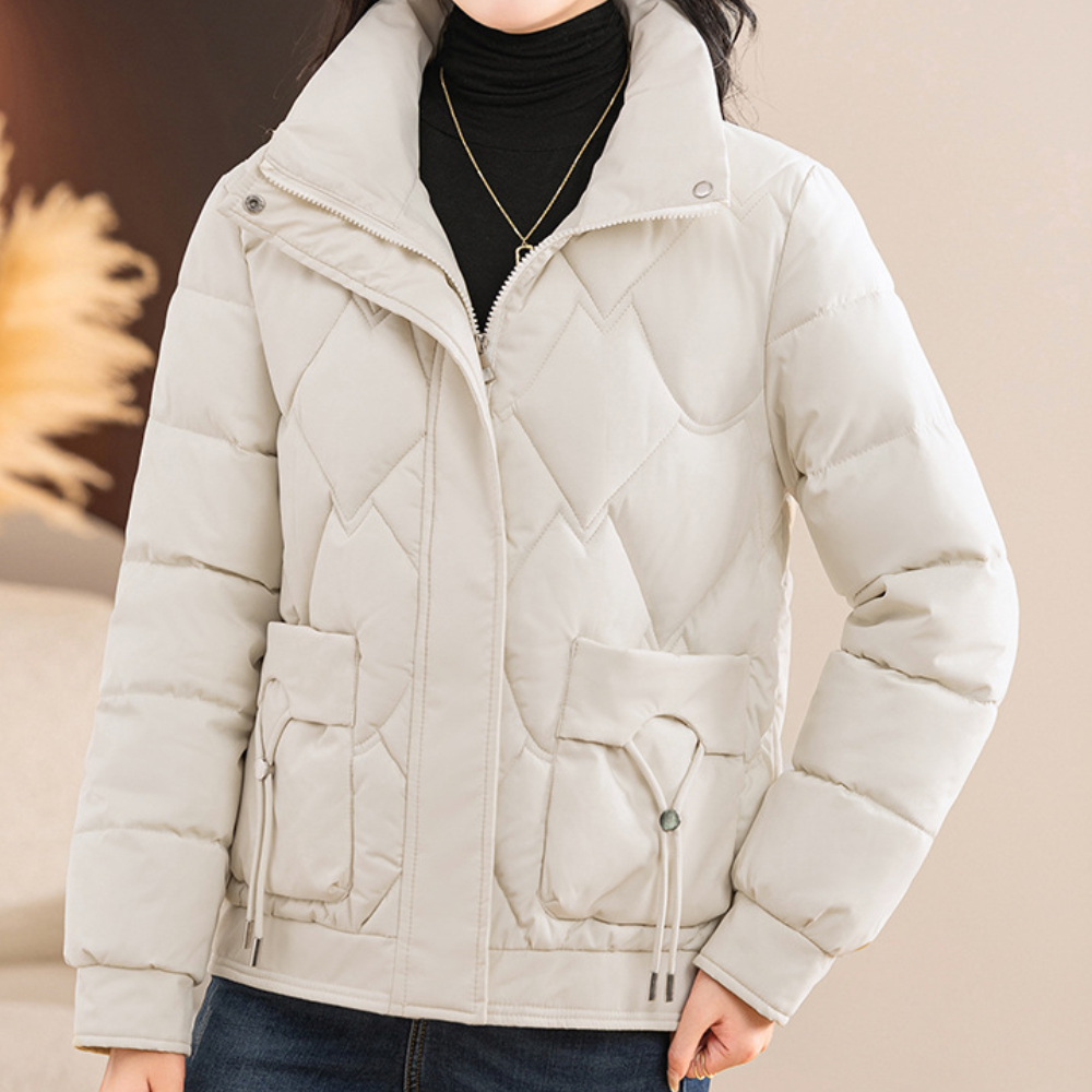 Dames winterjas, gewatteerd, lichtgrijs, met rits en zakken, modieuze quilted stijl, ideaal voor koude seizoenen, casual en stijlvol ontwerp.