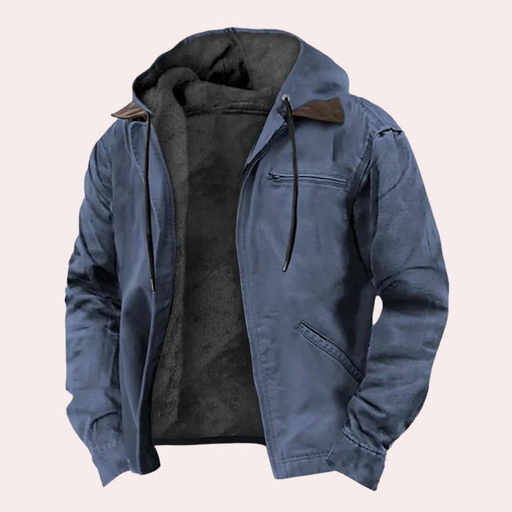 Blauwe herenjas met capuchon, ritssluiting en warme voering. Perfect voor wintermode en outdooractiviteiten. Comfortabele en stijlvolle jas.