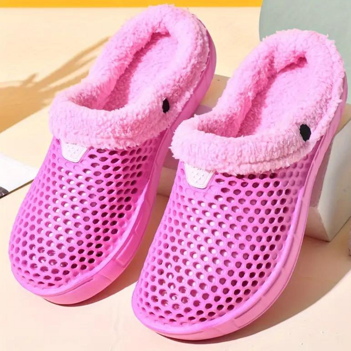 Roze ademende klompen met pluche voering, perfect voor comfort en stijl. Ideaal voor dagelijks gebruik binnenshuis. Trendy en functioneel schoeisel.