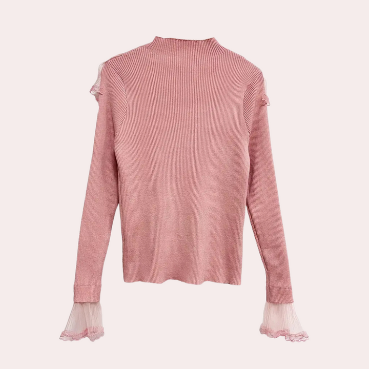 Roze geribbelde trui met lange mouwen en kanten details, modieuze dameskleding, trendy herfst- en wintermode, elegante stijl.