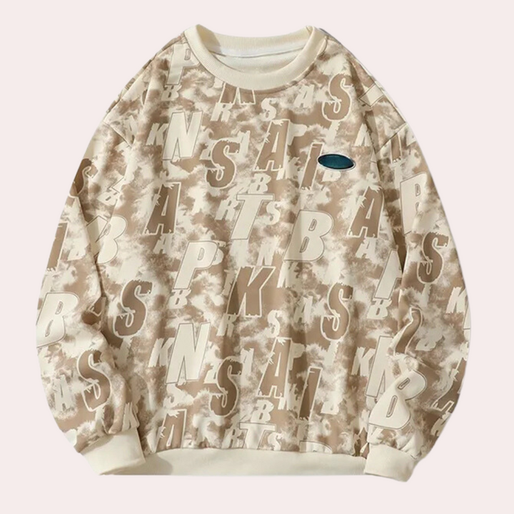 Beige oversized sweatshirt met abstracte letters en blauw logo, unisex streetwear, comfortabele katoenen trui, trendy mode, casual outfit.