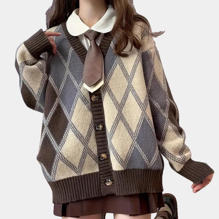 Dames oversized ruitjesvest in beige en bruin, met knopen en V-hals. Trendy herfstmode, perfect voor casual en stijlvolle outfits.