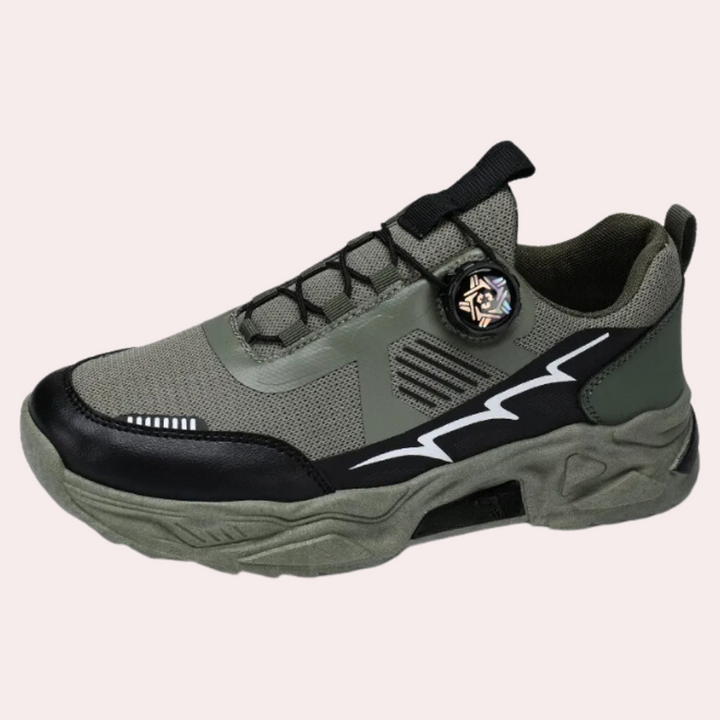 Groene en zwarte sportschoen met dikke zool, mesh bovenwerk en opvallend zigzagpatroon. Trendy sneaker voor heren, ideaal voor casual en sportieve looks.