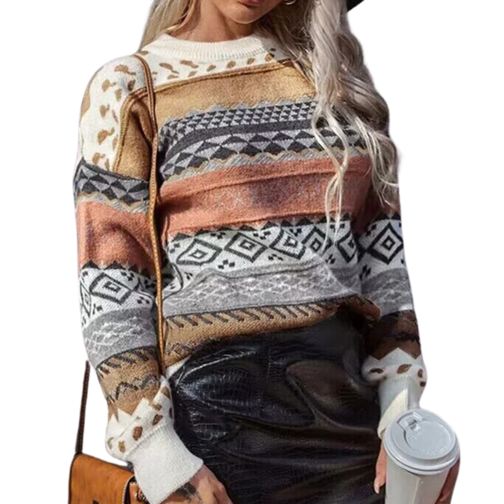 Vrouw in kleurrijke gebreide trui met etnisch patroon, draagt zwarte rok en houdt een koffiebeker vast. Modieuze herfstkleding, casual stijl.