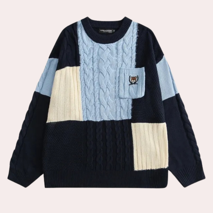 Donkerblauwe en lichtblauwe patchwork trui met kabelbreisel en borstzak, unisex design, casual mode, herfst-winter kleding.
