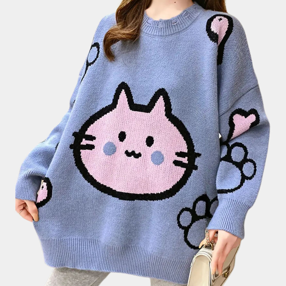 Blauwe oversized trui met schattige roze katprint, hartjes en pootafdrukken. Perfect voor casual mode en comfortabele winterkleding.