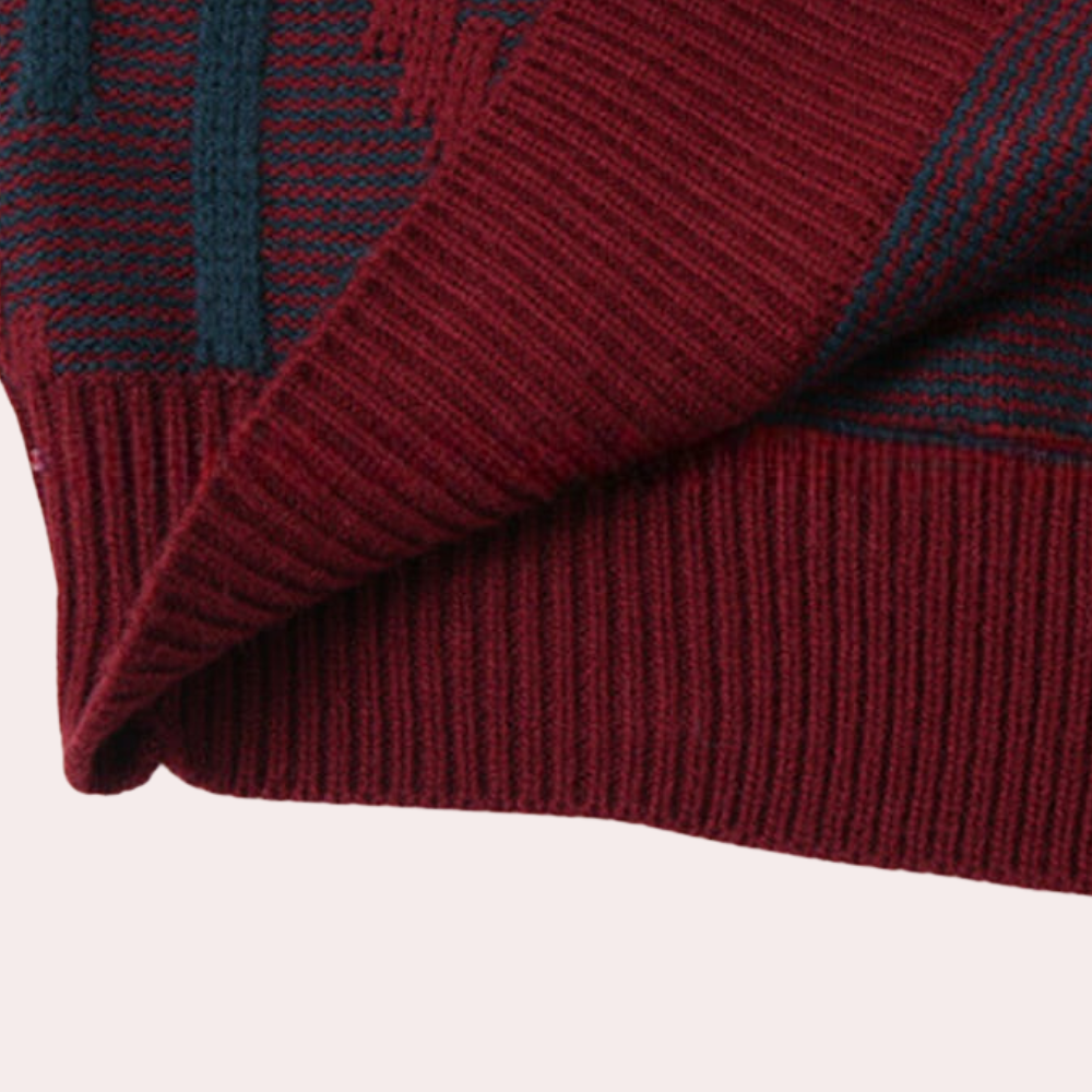 Rode en groene gebreide trui, close-up van de stof met ribbelpatroon, warme winterkleding, modieuze herentrui, hoogwaardige wolmix.