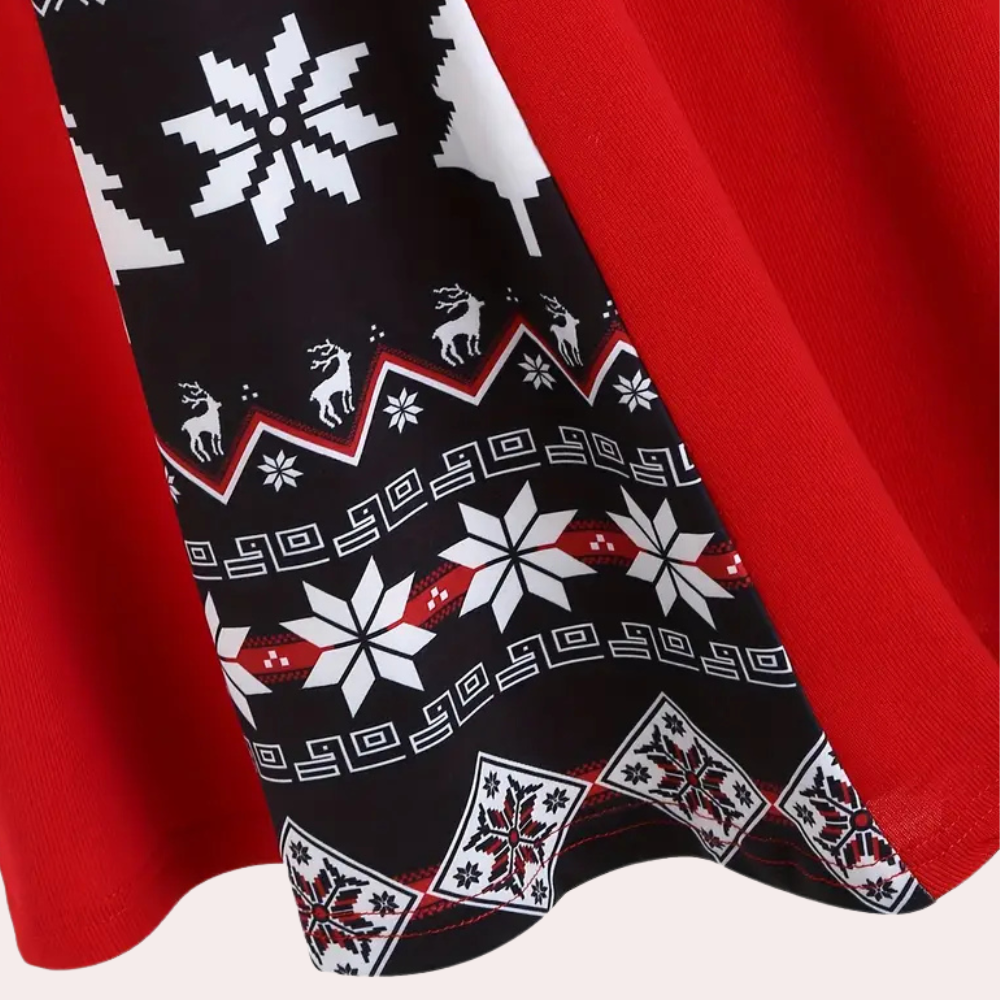 Rode en zwarte kerstjurk met sneeuwvlok- en rendierprint, wintermode, feestelijke kleding, dameskleding, kerstoutfit, trendy design.