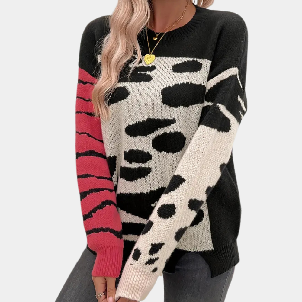 Damestrui met zwart-wit dierenprint en roze strepen, lange mouwen, ronde hals. Modieuze herfstkleding, comfortabele pasvorm.