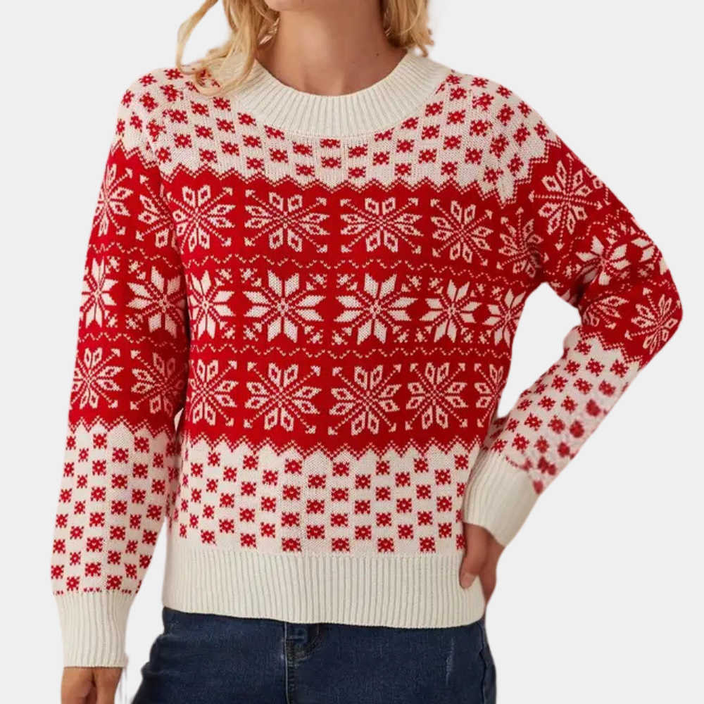 Rode en witte kersttrui met sneeuwvlokpatroon, gedragen door een vrouw. Perfect voor feestdagen, wintermode, warme kleding.