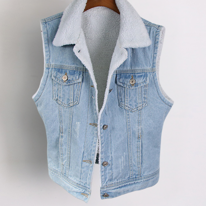 Lichtblauw spijkerjack met witte fleece voering, mouwloos ontwerp, metalen knopen, borstzakken. Trendy denim vest voor herenmode.