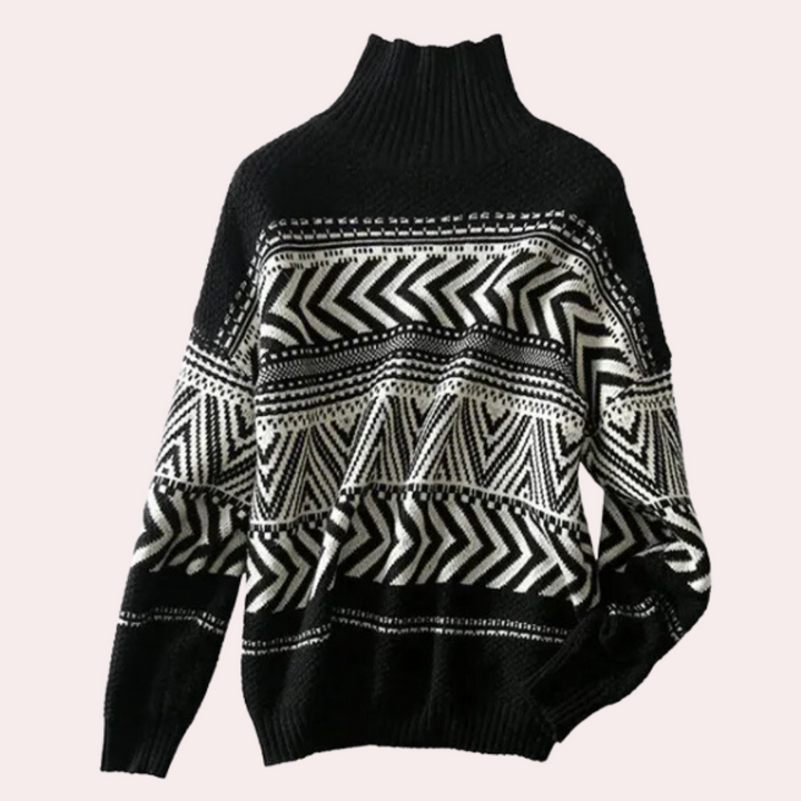 Zwart-witte gebreide trui met geometrisch zigzagpatroon en coltrui, wintermode, warme dameskleding, stijlvolle truien, trendy design.