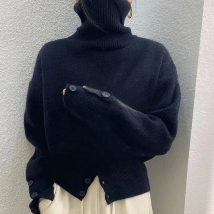 Zwarte coltrui dames, oversized pasvorm, knoopdetails, wintermode, warme trui, stijlvolle kleding, casual outfit, comfortabele stof.