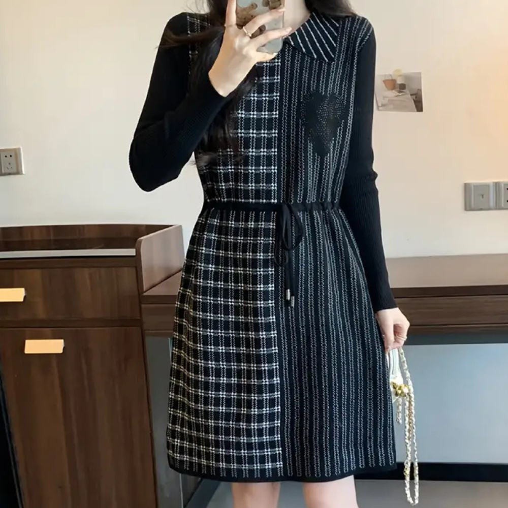 Zwart-wit geruite damesjurk met lange mouwen en kraag, elegant ontwerp, geschikt voor herfstmode, perfect voor casual en formele gelegenheden.