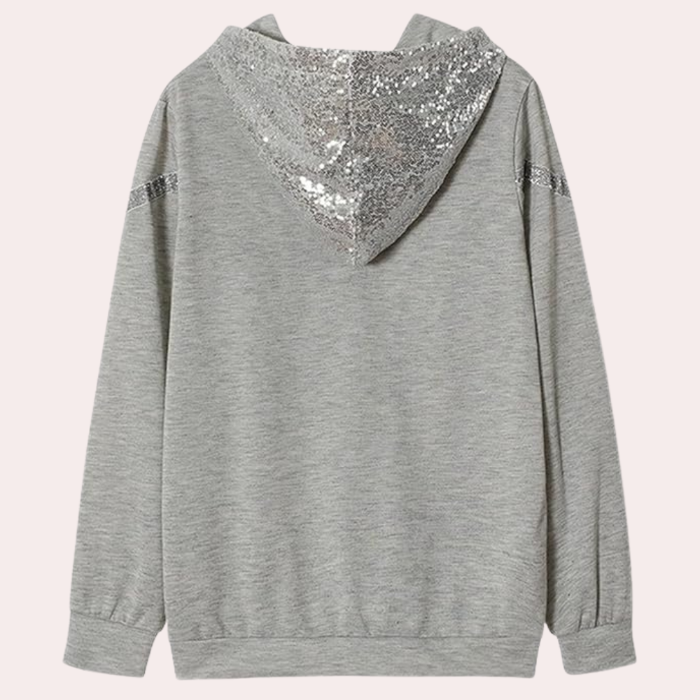 Grijze hoodie met glinsterende pailletten op de capuchon en schouders, casual dameskleding, trendy mode, comfortabele sweater, streetwear stijl.