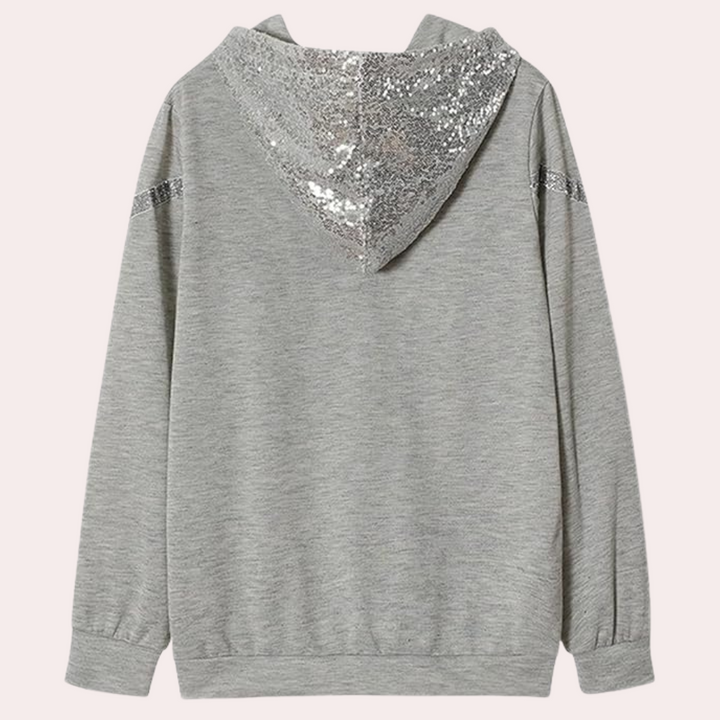 Grijze hoodie met glinsterende pailletten op de capuchon en schouders, casual dameskleding, trendy mode, comfortabele sweater, streetwear stijl.