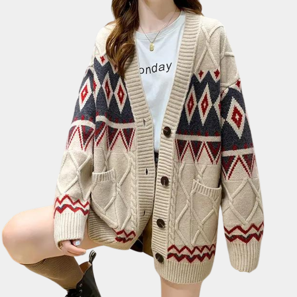 Beige oversized damesvest met geometrisch patroon, knopen en zakken. Trendy herfstmode, comfortabele gebreide cardigan voor casual outfits.